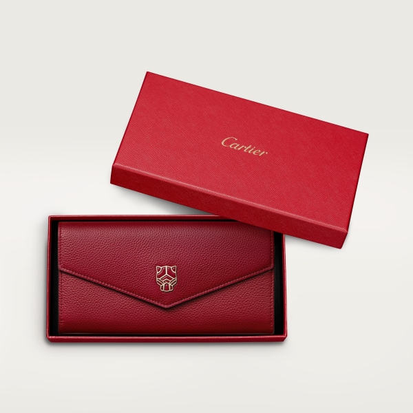 International wallet with flap, Panthère de Cartier Burgundy calfskin, golden finish and burgundy enamel