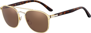 C de Cartier Sonnenbrille Kombination Goldfarben und Schwarz, Fassung im matten Gold-Finish, Nasenauflage im glatten Palladium-Finish, braune Gläser.