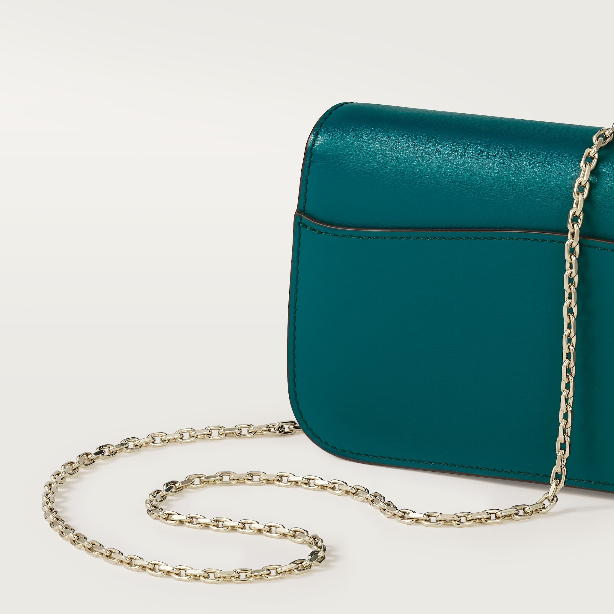 Mini model chain bag, Panthère de CartierPetrol blue calfskin, golden finish