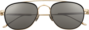 Gafas de sol C de Cartier Acetato negro y titanio dorado liso, lentes grises