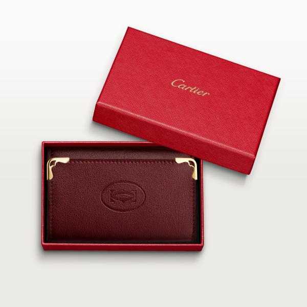 Must de Cartier Schlüsseletui für sechs Schlüssel Bordeauxrotes Kalbsleder, Gold-Finish