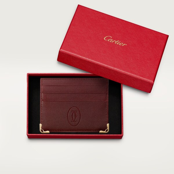 Tarjetero sencillo para seis tarjetas de crédito, Must de Cartier Piel de becerro color burdeos, acabado dorado