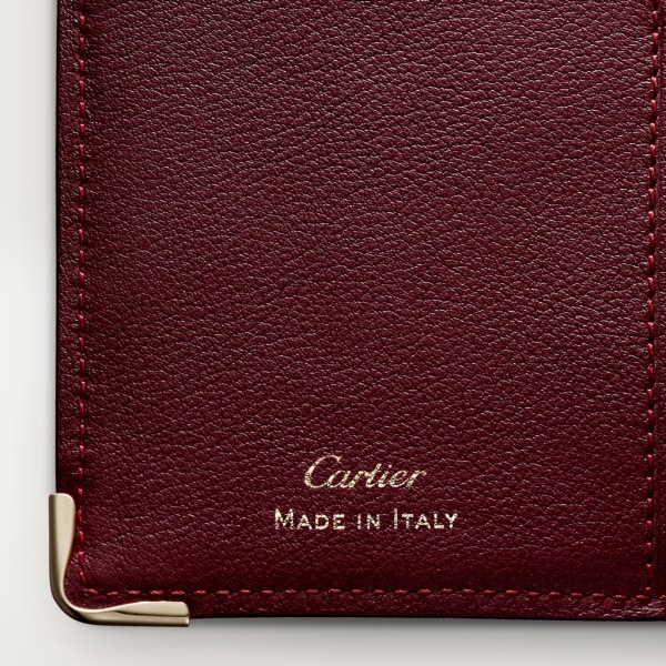 Porte-cartes Must de Cartier Cuir de veau couleur bordeaux, finition dorée
