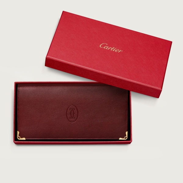 Zipped International Wallet, Must de Cartier Burgundy calfskin, golden finish