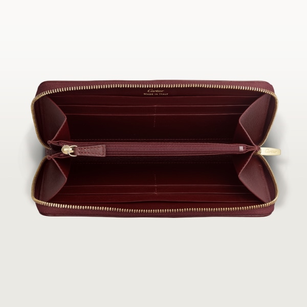 Zipped International Wallet, Must de Cartier Burgundy calfskin, golden finish