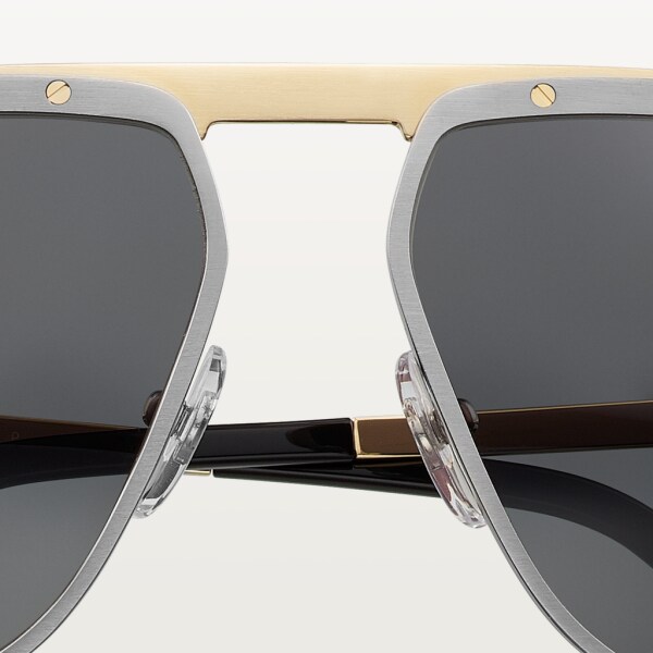 Gafas de sol Santos de Cartier Metal, acabado rutenio y champán dorado cepillado, lentes grises polarizadas.