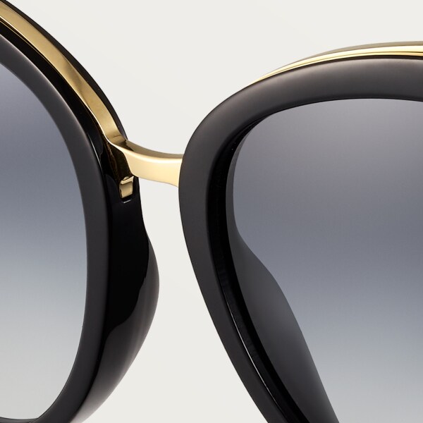 Gafas de sol Panthère de Cartier Combinadas de acetato negro, metal acabado dorado champán, lentes gris degradado