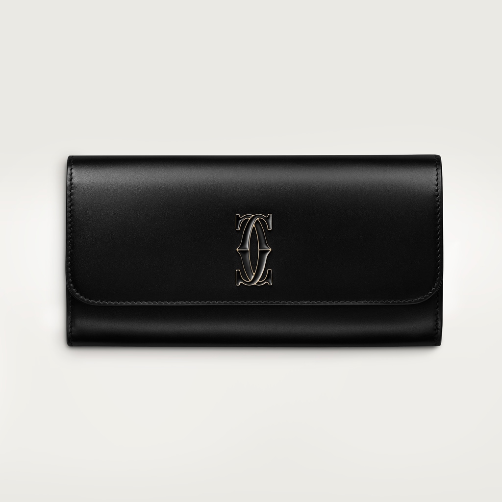 International wallet with flap, C de CartierBlack calfskin, gold and black enamel finish