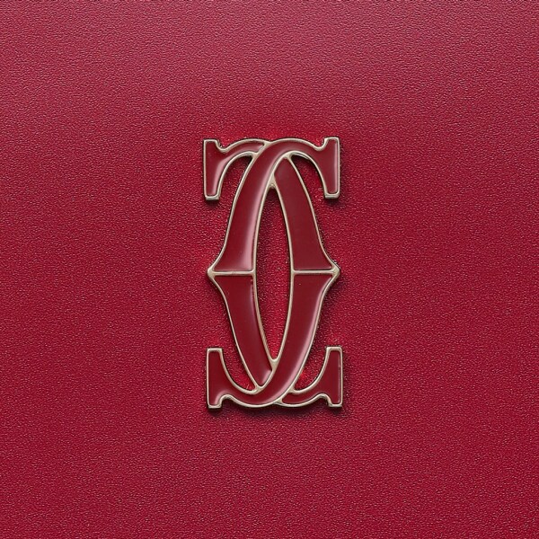 Pouch small model, Double C de Cartier Cherry red calfskin, gold and cherry red enamel finish