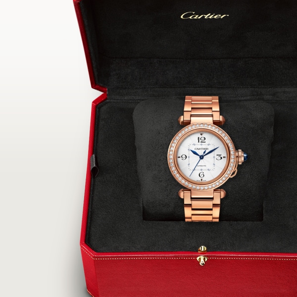 Reloj Pasha de Cartier 35 mm, movimiento automático, oro rosa, diamantes, brazalete de metal y correa de piel intercambiables