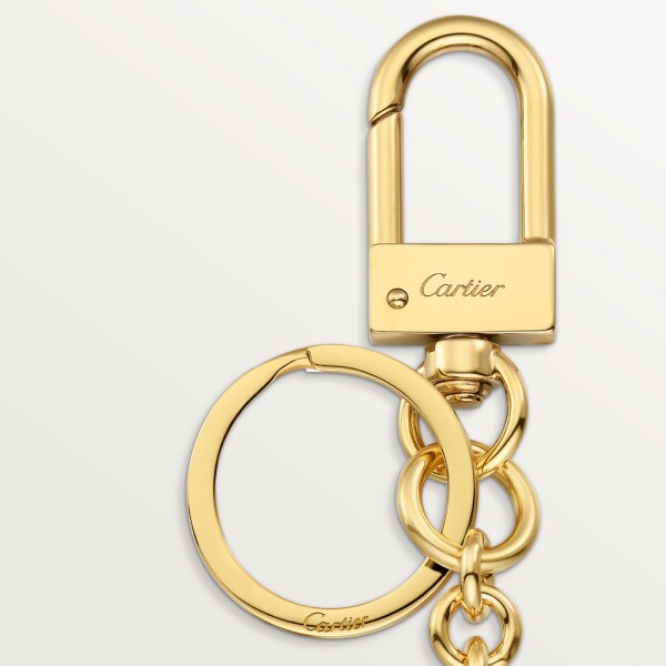 Diabolo de Cartier Schlüsselanhänger Wachssiegel Metall mit Lack und Gold-Finish