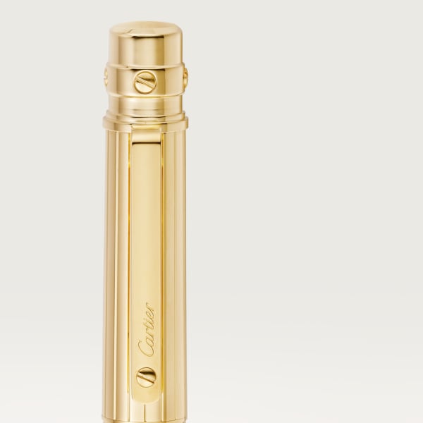 Stylo bille Santos de Cartier Grand modèle, métal gravé, finition dorée