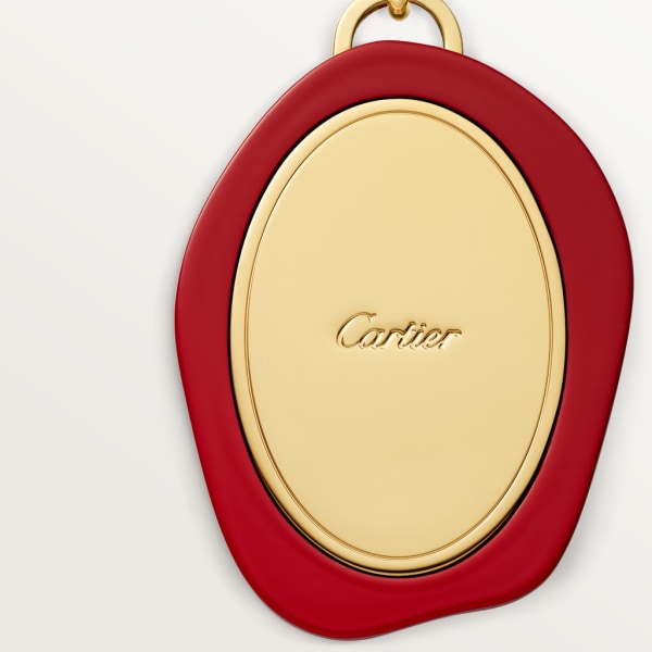 Diabolo de Cartier Schlüsselanhänger Wachssiegel Metall mit Lack und Gold-Finish