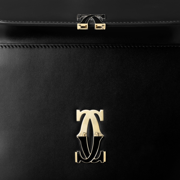 Mini shoulder bag, C de Cartier Black calfskin, gold and black enamel finish