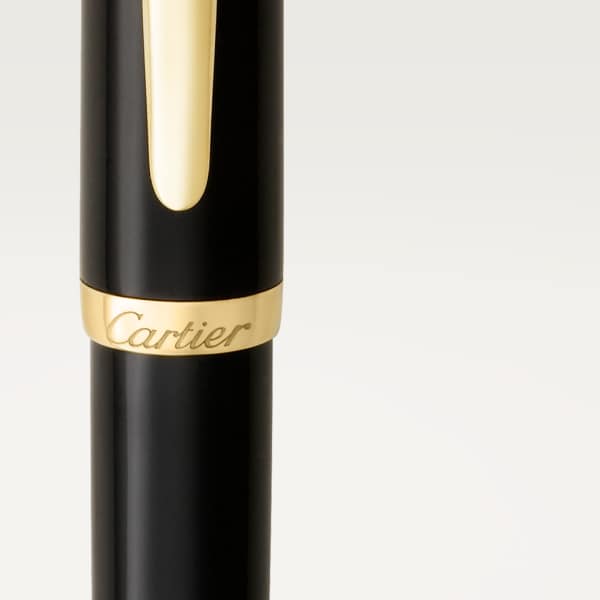 Pluma estilográfica R de Cartier Composite negro, detalles acabado dorado amarillo