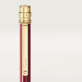 Santos de Cartier ballpoint pen Small model, burgundy lacquer, gold finish