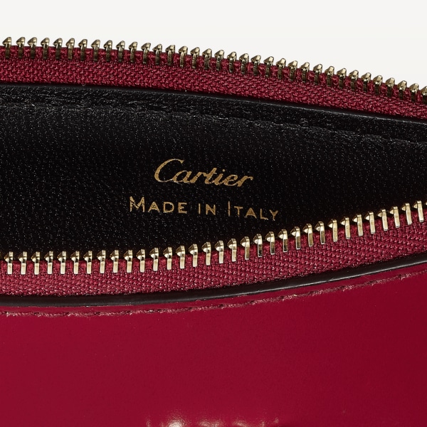 Zipped card holder, C de Cartier Cherry red calfskin, golden finish and cherry red enamel