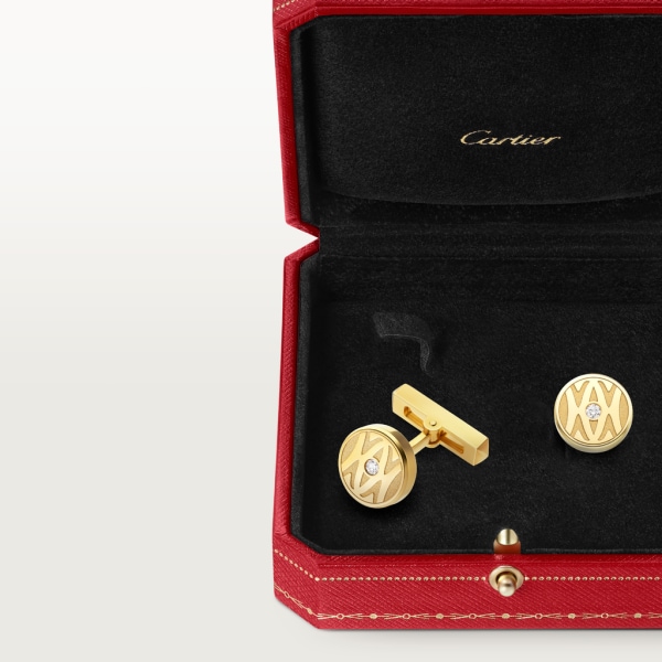 Manschettenknöpfe mit Cartier Logo-Dekor aus Gold. Gelbgold, Diamanten im Brillantschliff.