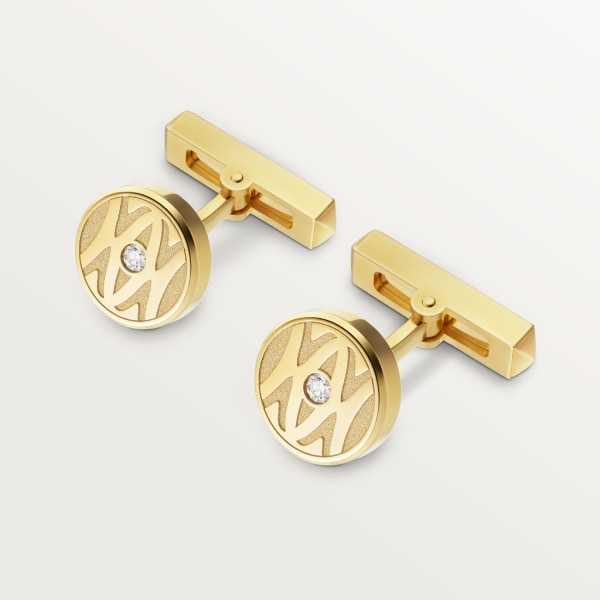 Cufflinks with gold C de Cartier logo. Yellow gold, brilliant-cut diamonds.