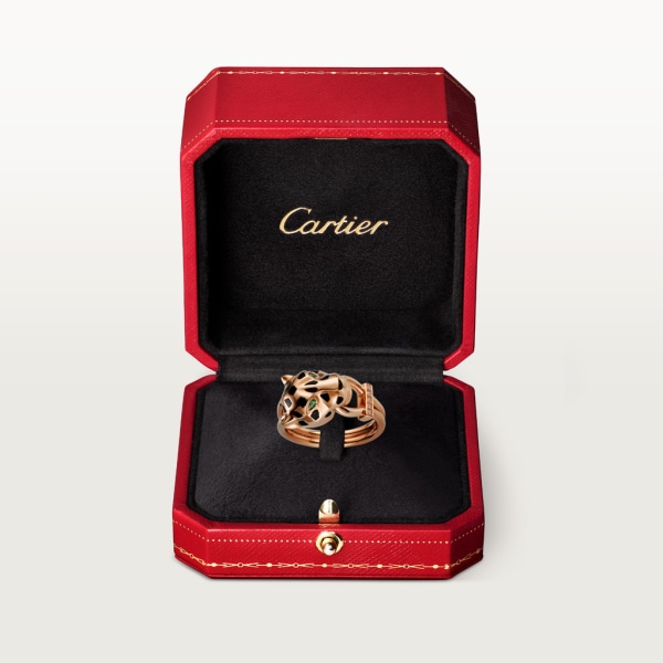 Bague Panthère de Cartier Or rose, grenats tsavorite, onyx, laque noire, diamants