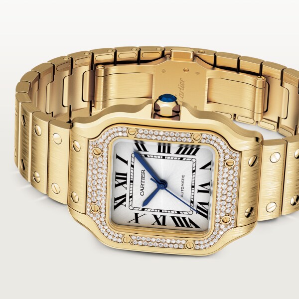 Montre Santos de Cartier Moyen modèle, mouvement automatique, or jaune, diamants, bracelets métal et cuir interchangeables
