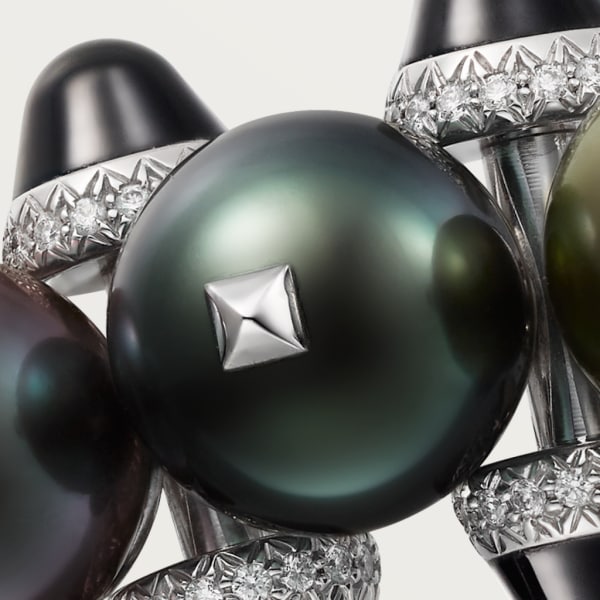 Broche Clash de Cartier Or gris rhodié, perles de Tahiti, onyx, diamants