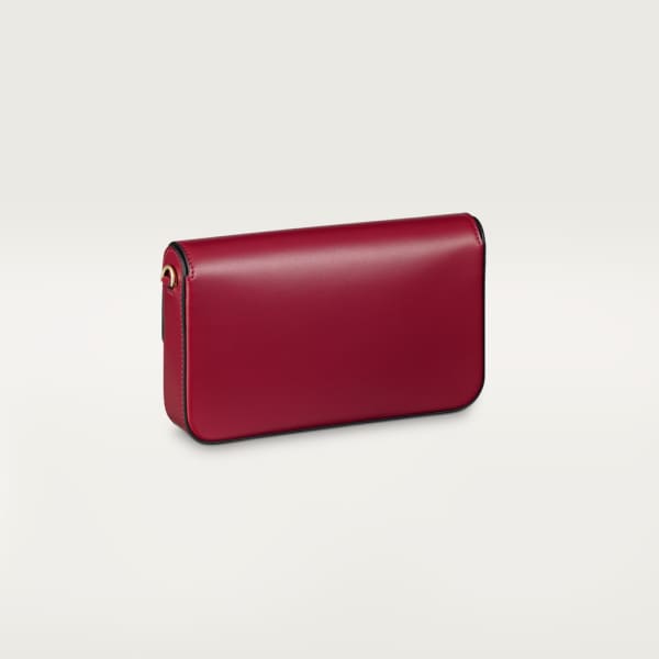 Sac chaine mini modèle, C de Cartier Cuir de veau rouge cerise, finition dorée et émail rouge cerise