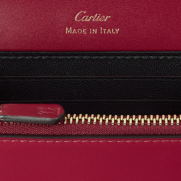 Minicartera, C de Cartier Piel de becerro color rojo cereza, acabado dorado y esmalte color rojo cereza