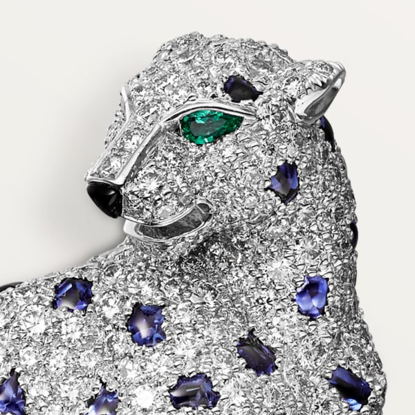 Broche Panthère de Cartier Or gris, émeraudes, saphirs, onyx, diamants