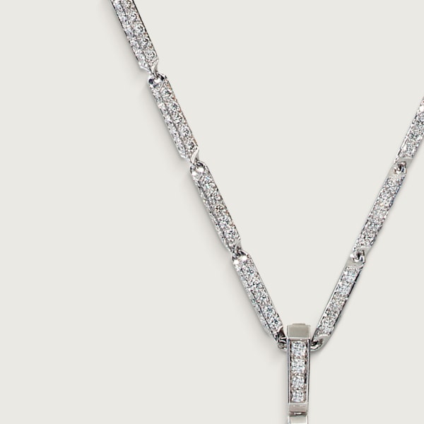 Collier Panthère de Cartier Or gris, émeraudes, onyx, diamants