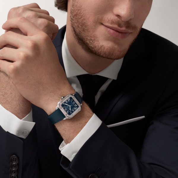Santos de Cartier watch Medium model, automatic movement, steel, diamonds, blue dial, interchangeable metal and leather bracelets