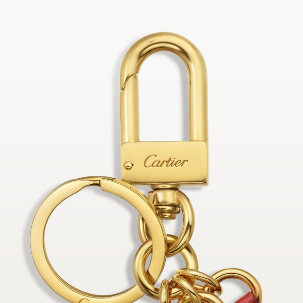 Porte-clé sceau Diabolo de Cartier Métal laqué, cuir, finition dorée