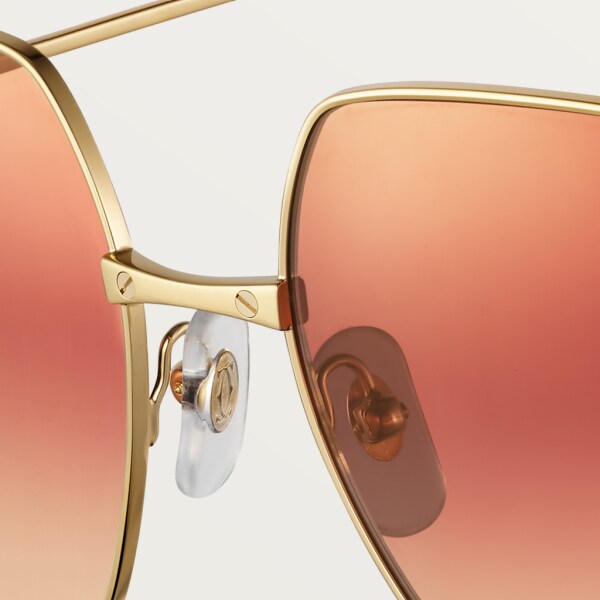 Gafas de sol Santos de Cartier Metal acabado dorado liso y cepillado, lentes color burdeos y albaricoque degradado con flash rosa