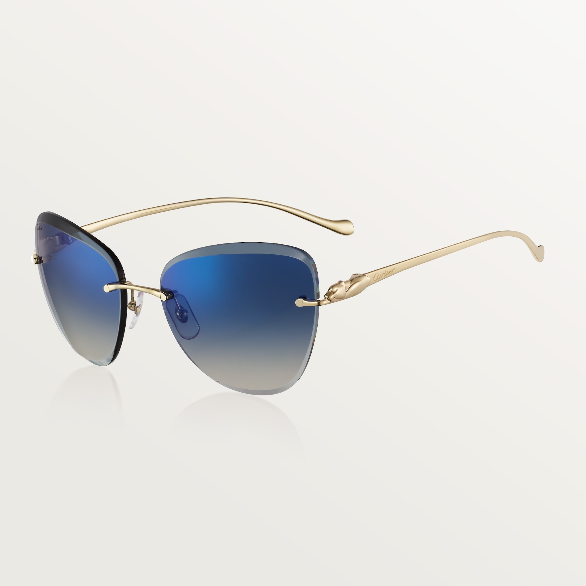 Gafas de sol Panthère de CartierMetal acabado dorado liso, lentes degradadas azules