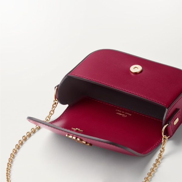 Micro chain bag, C de Cartier Cherry red calfskin, golden finish and cherry red enamel