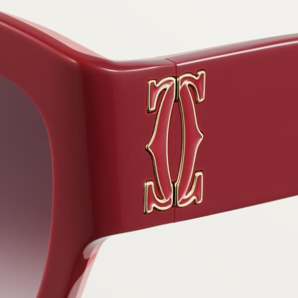 Gafas de sol Signature C de Cartier Acetato burdeos nude, logotipo de esmalte burdeos, lentes burdeos degradado