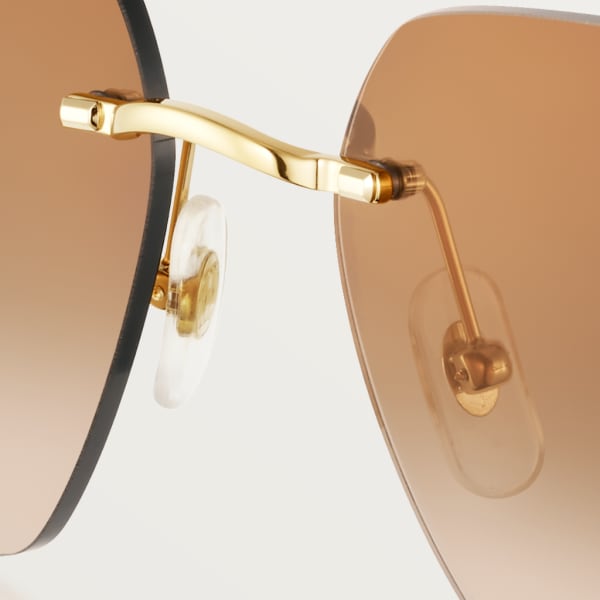 Gafas de sol Signature C de Cartier Metal acabado dorado liso y cepillado, lentes degradadas marrones
