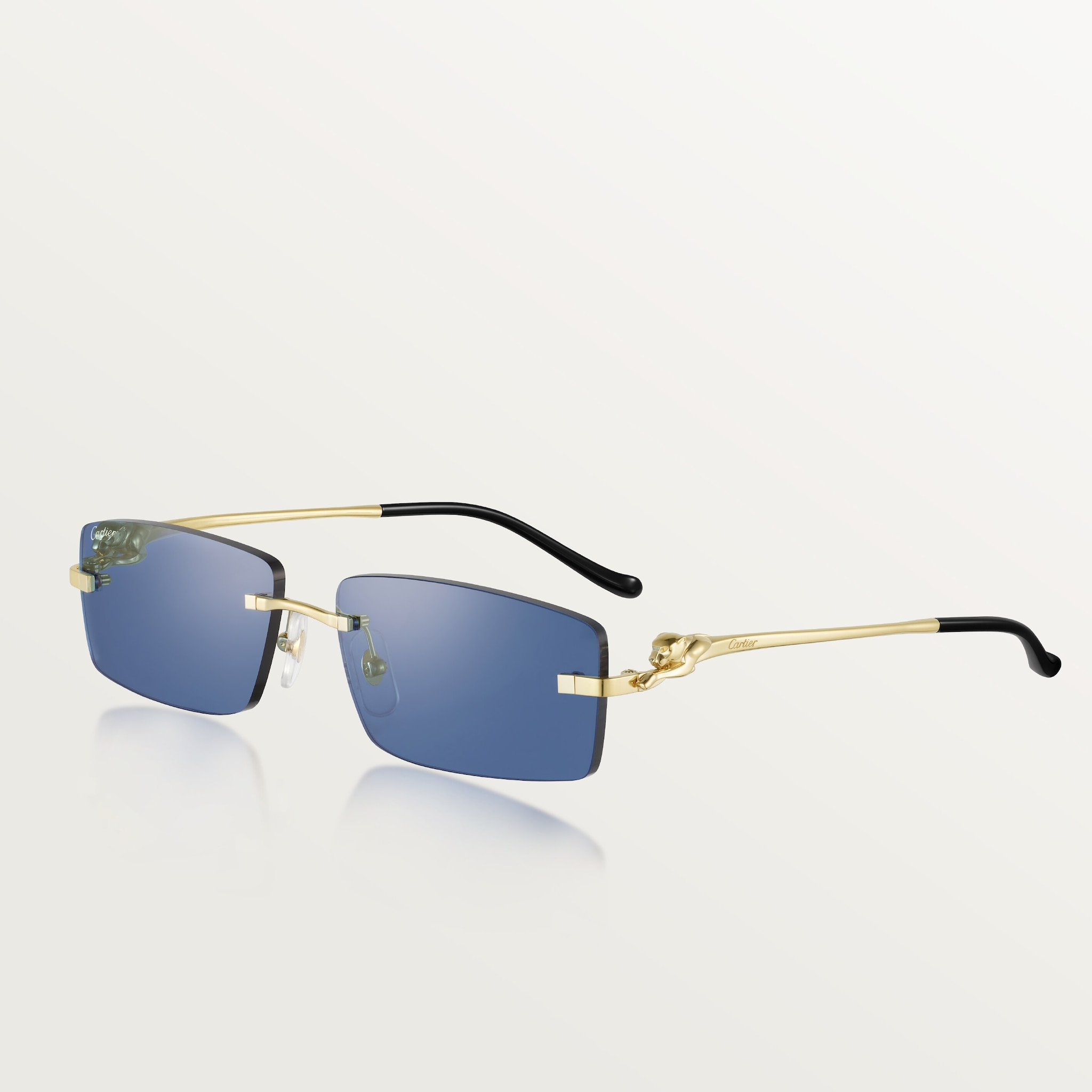 Gafas de sol Panthère de CartierMetal acabado dorado liso, lentes azules