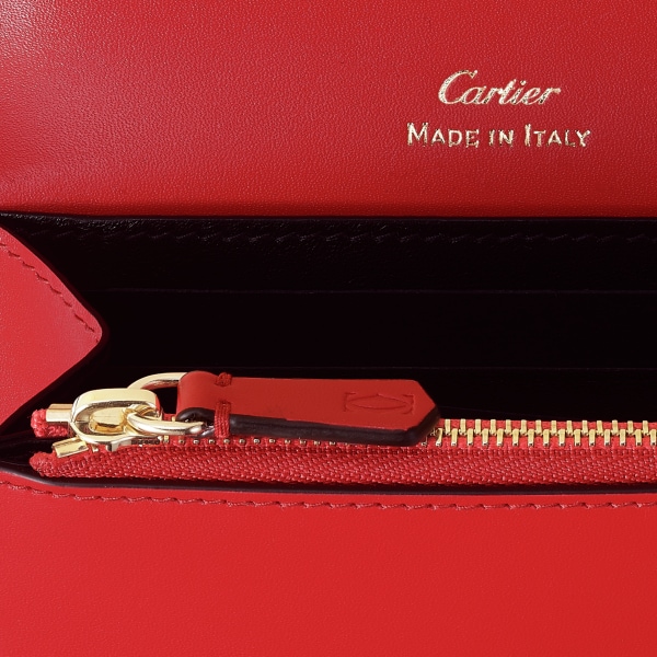 Pequeña marroquinería C de Cartier, cartera Piel de becerro rojo cereza, acabado dorado y esmalte rojo cereza
