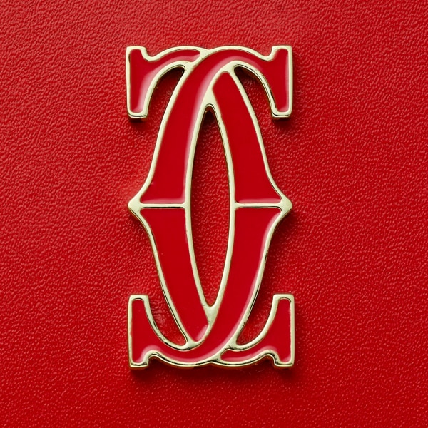 Pequeña marroquinería C de Cartier, tarjetero Piel de becerro roja, acabado dorado y esmalte rojo