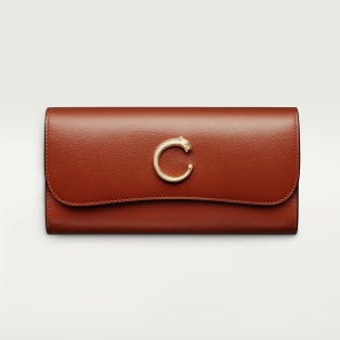 International wallet with flap, Panthère de Cartier
 Chestnut calfskin, golden finish