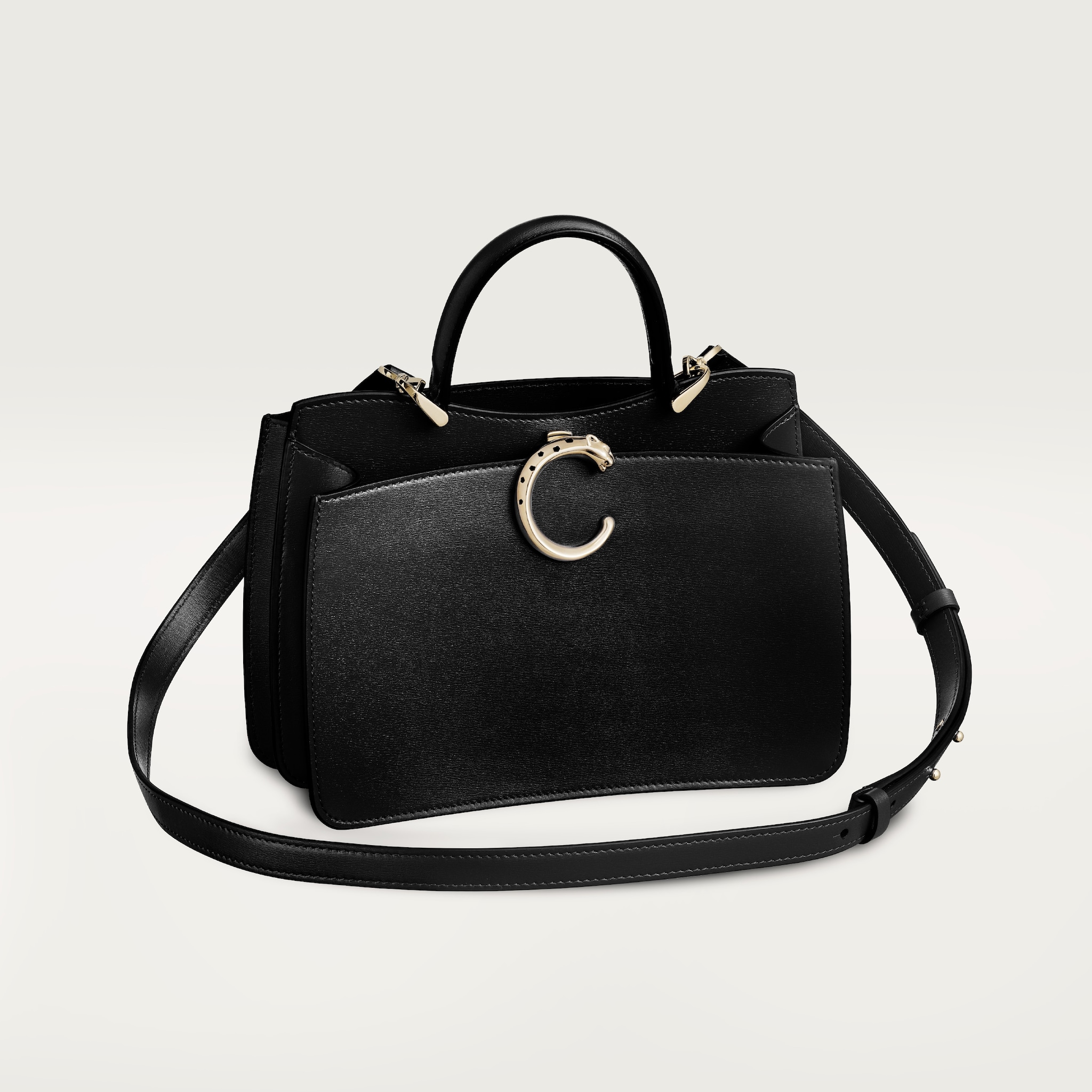 Handle bag mini model, Panthère de CartierBlack calfskin, golden finish