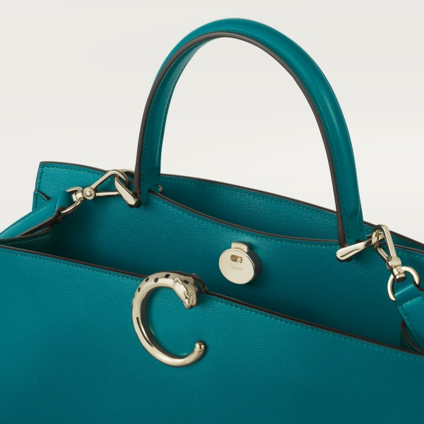 Small model handle bag, Panthère de Cartier Petrol blue calfskin, golden finish
