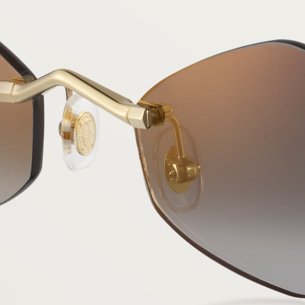 Gafas de sol Panthère de Cartier Metal acabado dorado liso, lentes degradadas grises