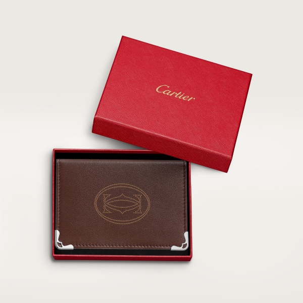 Pequeña marroquinería Must de Cartier, tarjetero Piel de becerro dots chocolate, acabado paladio