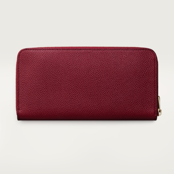 Zipped international wallet, Panthère de Cartier Burgundy grained calfskin, golden finish