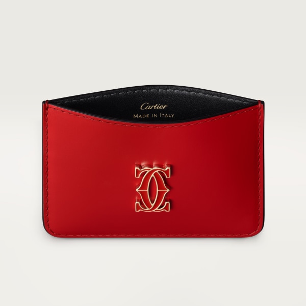 Pequeña marroquinería C de Cartier, tarjetero Piel de becerro roja, acabado dorado y esmalte rojo