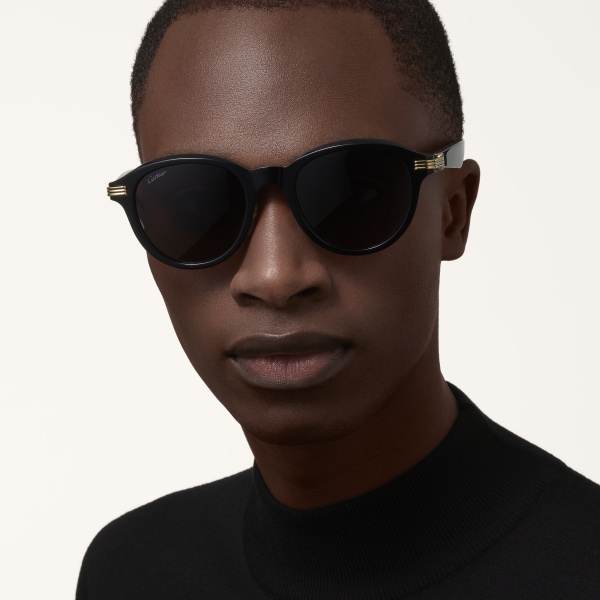 Gafas de sol Première de Cartier Acetato negro, lentes grises