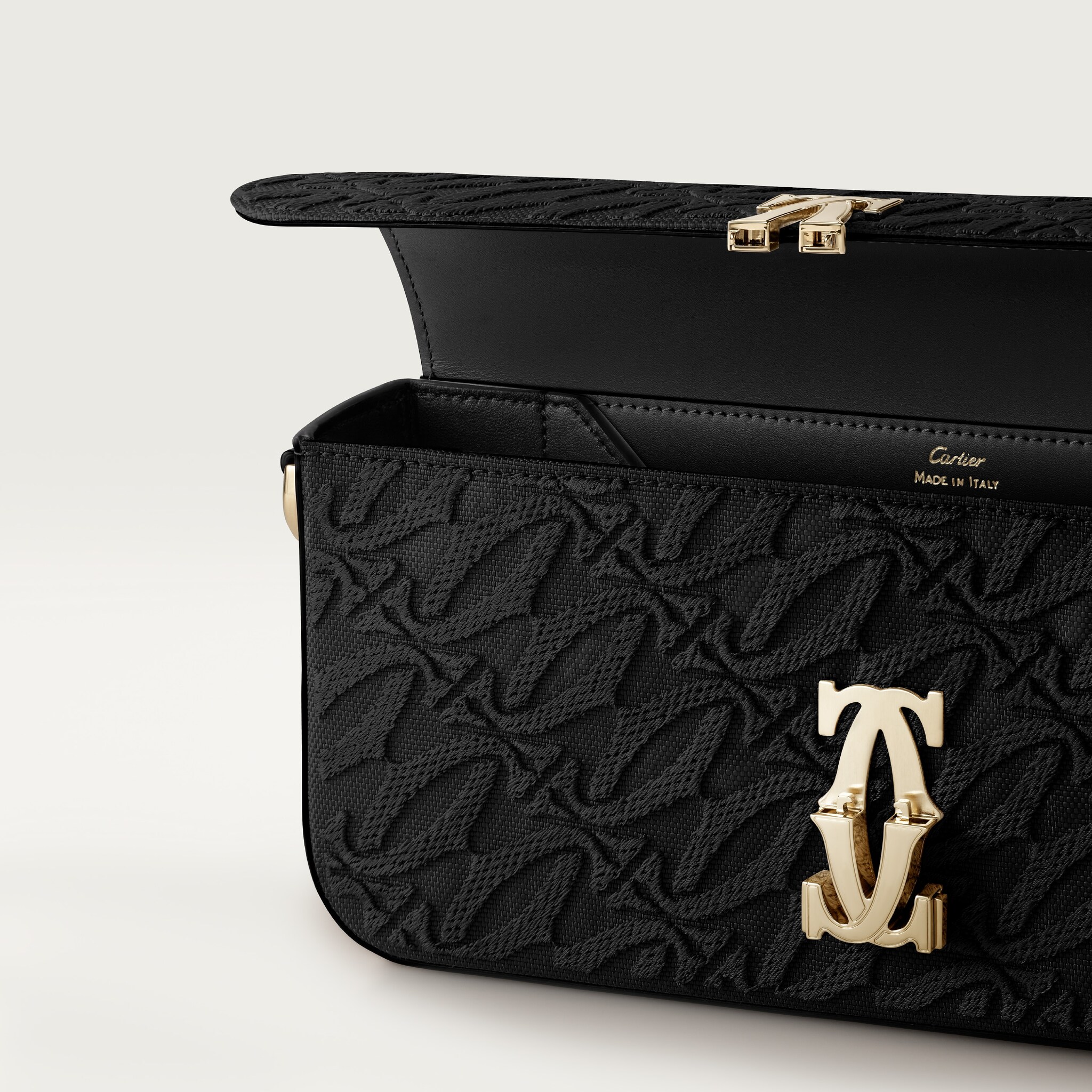 C de Cartier east-west bagEmbroidery, black calfskin, golden finish