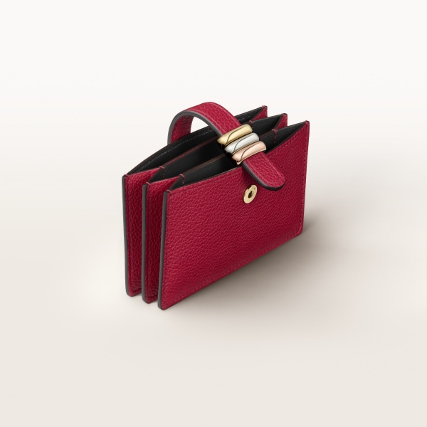 Accordion card holder, Trinity Ruby-coloured grained calf leather with gold, palladium or rose gold finish